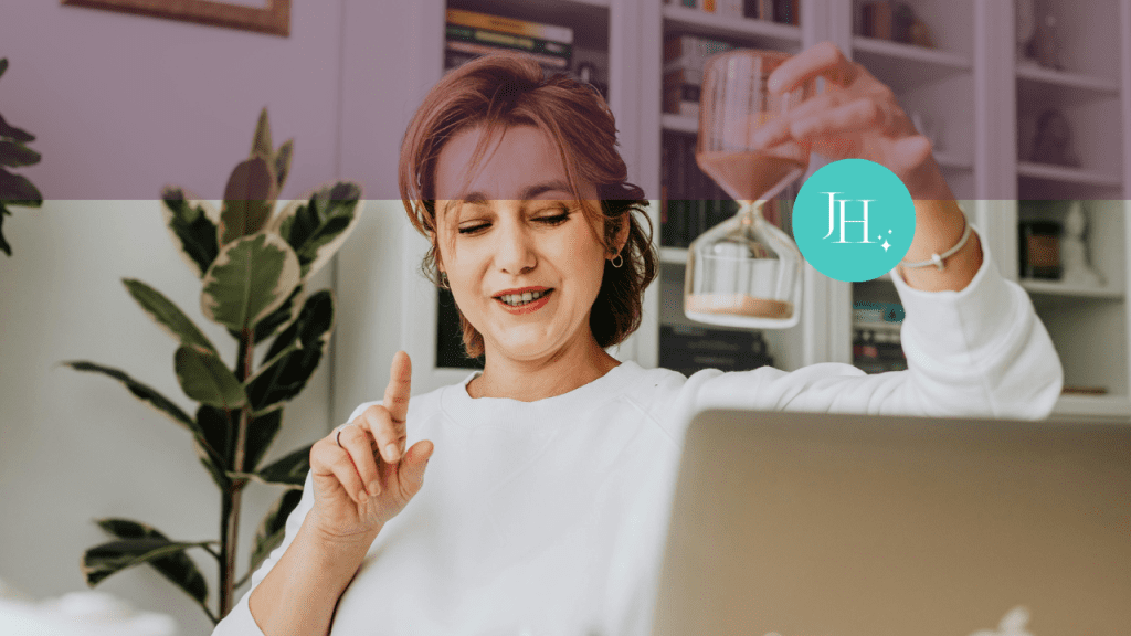 A woman pointing at her hourglass - personal development goals