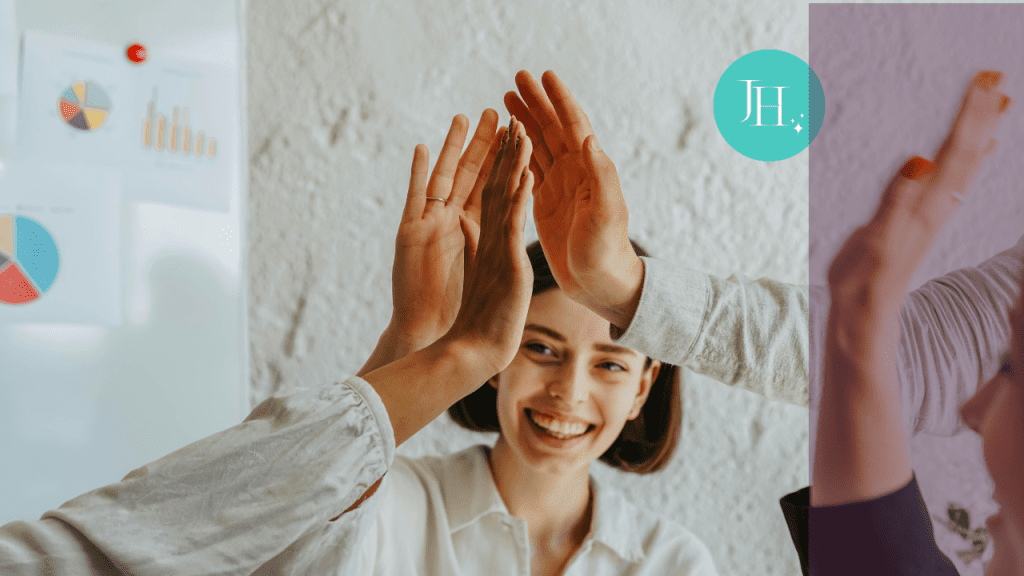 A woman celebrating with her team - Scaling Teams