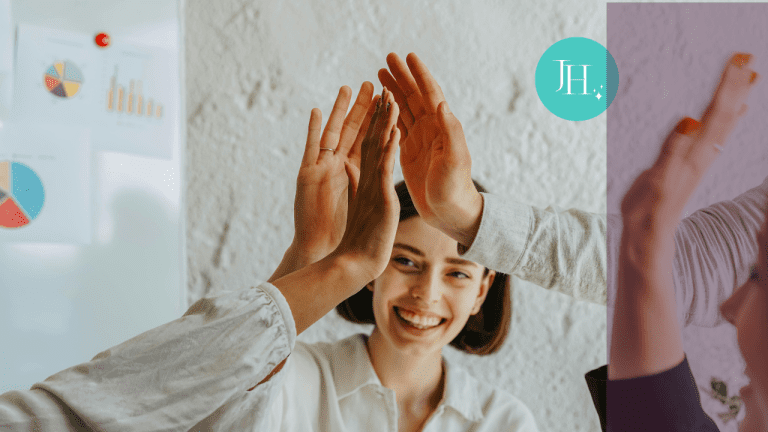 A woman celebrating with her team - Scaling Teams