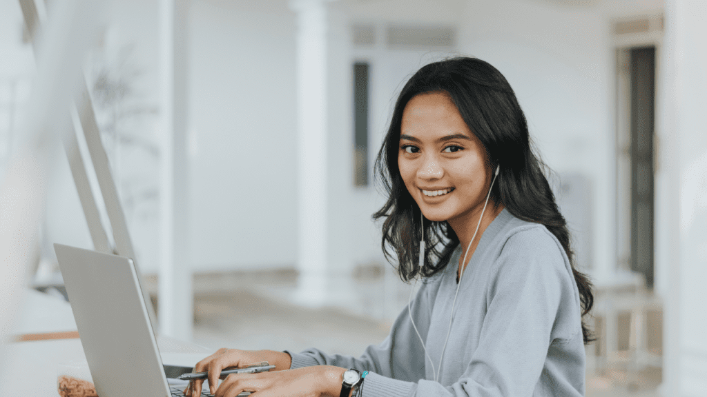 Woman Working on a Laptop in the Garden - mindful productivity